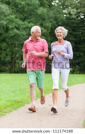 Active senior couple in the park
