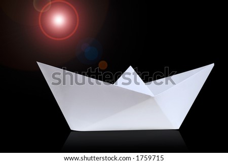 Paper boat with black background