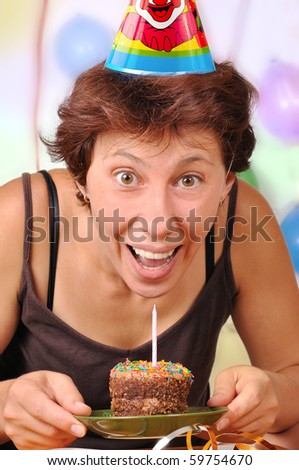 woman with a cake and candles on his birthday