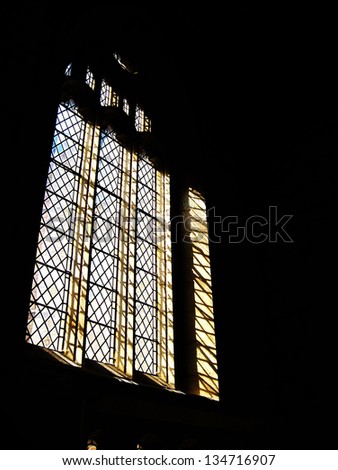 YORK, UK - APRIL 4: Stained glass window in York St. Mary's Church on April 4, 2013 in York. The church is currently displaying the shortlisted works for the Aesthetica Art Prize.
