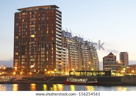 MANCHESTER, UK - SEPTEMBER 2013: View of residential housing, Manchester, September 29 2013 , England. Future plans aim to spread the success of Salford Quays\' regeneration in Irwell River Plan