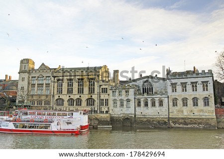 YORK,UK - FEBRUARY 20: River boats in front the Guildhall, York, 20 February, 2014. York's 30th Jorvik festival explores the Viking world of myths and legends from the 15th February 2014