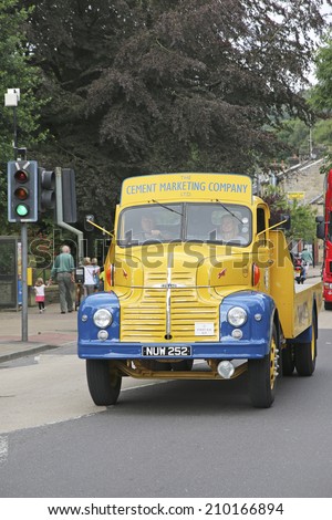 HEBDEN BRIDGE, WEST YORKSHIRE - AUGUST 2, 2014: Vintage commercial vehicle driving through Hebden Bridge which is taking part in the 46th Transpennine Commercial run from Manchester to Harrogate