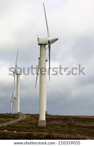 HALIFAX, WEST YORKSHIRE - AUGUST  11, 2014: The 23 turbines of Ovenden Moor wind farm are supplying sustainable clean, green power and have now been doing for over 15 years.