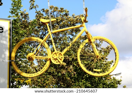 GREETLAND, WEST YORKSHIRE - AUGUST 11, 2014: Yellow Bike. Mementos of the Grand Depart (Tour de France 2014) still line the route through West Yorkshire