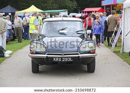HEBDEN BRIDGE, WEST YORKSHIRE - AUGUST 2, 2014: Citroen DS. The donations of the Vintage Weekend goes to The Rotary Club of Hebden Bridge which is distributed to charities and good causes.