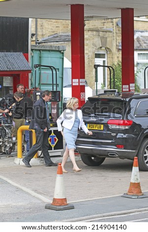 RIPPONDEN, WEST YORKSHIRE - SEPTEMBER 3 2014: Film crew filming a scene for  comedy TV series at the local petrol station in Ripponden