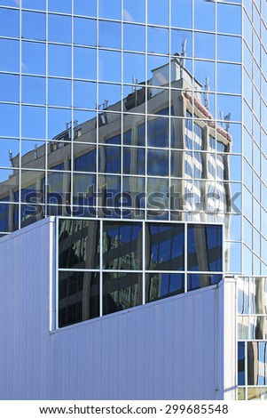 HAMILTON, ONTARIO - JULY 20, 2015: Reflections of commercial building, Hamilton. Hamilton is the centre of a densely populated and industrialized region at the west end of Lake Ontario