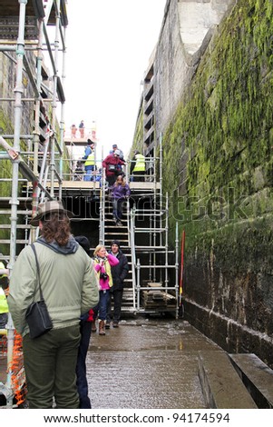 BINGLEY, UK – JANUARY 29: Hundreds of people flock to visit to famous Bingley Five Rise Locks to observe the replacement of four of the lock gates which has a rise of 60ft. January 29, 2012, Bingley