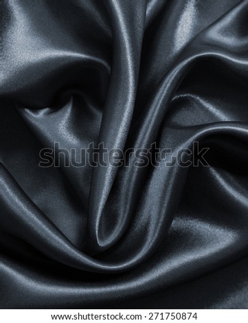 Smooth elegant dark grey silk or satin can use as background