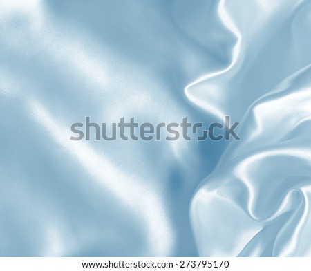 Smooth elegant blue silk or satin can use as background