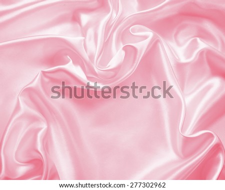 Smooth elegant pink silk or satin texture can use as wedding background