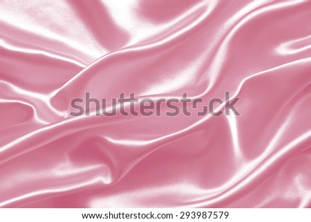 Smooth elegant pink silk or satin texture can use as background