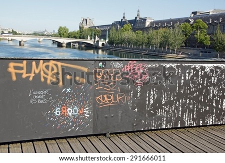 End of the padlocks on the Pont des Arts Paris,  4 street art's artist: Jace, El Seed, Brusk, Pantinio exhibit their work. Installation of street art on the Pont des Arts (Paris France). 06/june/2015
