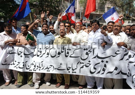 HYDERABAD, PAKISTAN - OCT 02: Journalists and members of Civil Society are protesting against killing of a Journalist Abdul Haq in Khuzdar, on October 02, 2012 In Hyderabad.
