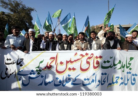 PESHAWAR, PAKISTAN - NOV 20: Activists of Jamat-e-Islami are protesting against  attack on Jamat-e-Islami leader Mulana Qazi Hussain Ahmed during a demonstration on November 20, 2012 in Peshawar.