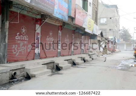 QUETTA, PAKISTAN - FEB 01: Shops seen closed during shutter down strike called by JUI and BNP (Awami) against governor rule in province Balochistan, on February 01, 2013 in Quetta.