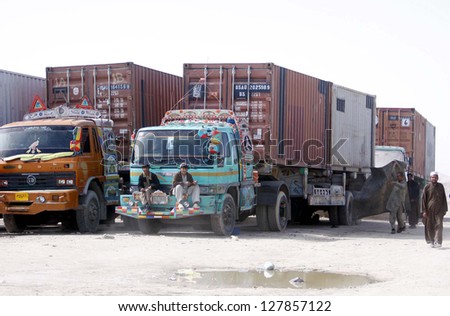 CHAMAN, PAKISTAN - FEB 11: Trucks waiting for custom clearance carrying US military  equipments at Pak-Afghan Border in Chaman on Monday, February 11, 2013.