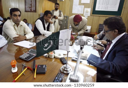 PESHAWAR, PAKISTAN - APR 04: General election public candidates submit their  nomination papers to returning officer to take part in General Election 2013, on April 04, 2013 in Peshawar.