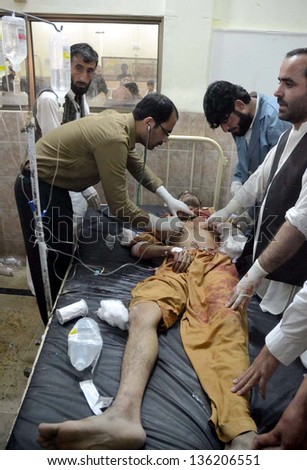 QUETTA, PAKISTAN - APR 23: Victim of Gawalmandi area bomb blast is being treated at  Civil Hospital on April 23, 2013 in Quetta. Several people were injured in three back-to-back blasts in Quetta