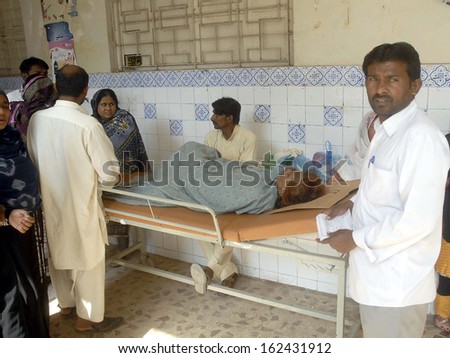 KARACHI, PAKISTAN - NOV 11: Patients seen perturbed as the OPD is closed during strike called by doctors against torture upon paramedics by unknown persons, on November 11, 2013 in Karachi.