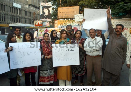 KARACHI, PAKISTAN - NOV 11: Civil Society are protesting against Jamat-e-Islami (JI) and demanding to ban JI because of its extremist and conservative behavior, on  November 11, 2013 In Karachi.