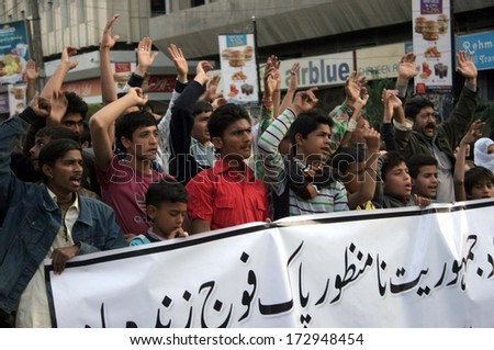 KARACHI, PAKISTAN - JAN 24: Shiite Muslims are protesting against bombs blast on a bus of pilgrims belongs to Shia Hazara Community at Mustang, during a demonstration  on January 24, 2014 in Karachi.