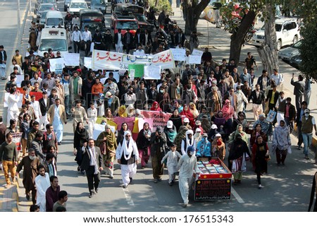 LAHORE, PAKISTAN - FEB 13: Long March for recovery of Baloch missing persons started from Quetta to Islamabad arrived in Lahore here on Wednesday evening on Thursday, February 13, 2014 in Lahore.