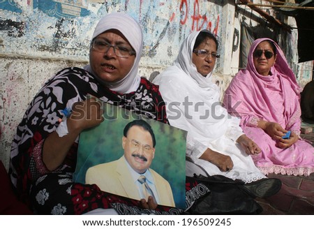 KARACHI, PAKISTAN - JUN 03: MQM women leaders are protesting against detention of their chief Altaf Hussain in London, during a demonstration held at press club on June 03, 2014 in Karachi.