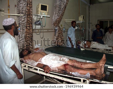 KARACHI, PAKISTAN - JUN 05: Views after suicidal bomb blast near Mustafa Mosque in  Orangi Town area on June 05, 2014 in Karachi. The blast left two persons killed including suicidal.