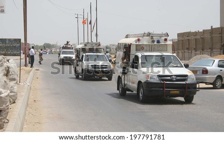 KARACHI, PAKISTAN - JUN10: Security forces are patrolling to cordon off the area after an attack by unidentified persons on Airport Security Force (ASF) camp number 2, on June 10, 2014 in Karachi.