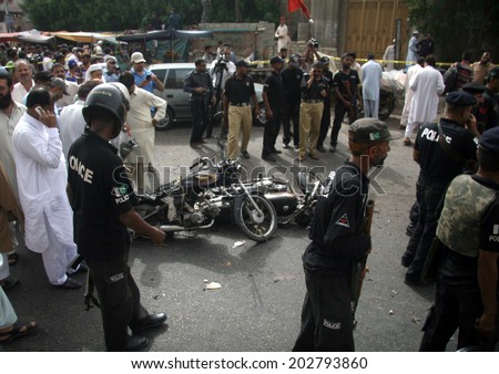 KARACHI, PAKISTAN - JUL 04: Views after blast which left at least two people have lost their lives and three people were injured on Preedy Street of the Saddar area on July 04, 2014  in Karachi.