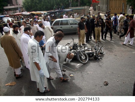 KARACHI, PAKISTAN - JUL 04: Views after blast which left at least two people have lost their lives and three people were injured on Preedy Street of the Saddar area on July 04, 2014 in Karachi.