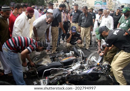 KARACHI, PAKISTAN - JUL 04: Views after blast which left at least two people have lost their lives and three people were injured on Preedy Street of the Saddar area on July 04, 2014 in Karachi.