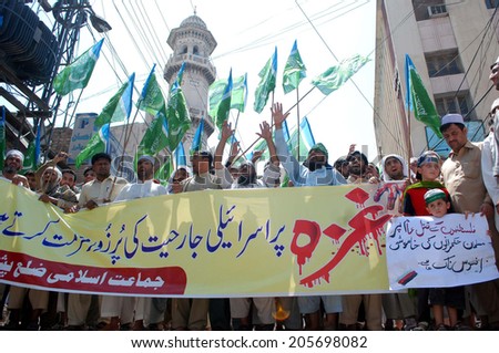PESHAWAR, PAKISTAN - JUL 18: Jamat-e-Islami are protesting against the killing of Muslims in the Gaza Strip by Israel. 265 Palestinians have been killed and 1200 injured on July 18, 2014 in Peshawar.