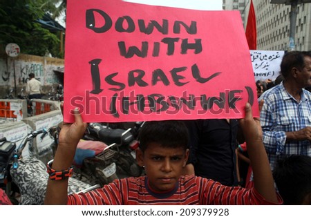 KARACHI, PAKISTAN - AUG 06: Citizens of Karachi are protesting against Israel assailant on Gaza and killing on innocent Muslims during a protest demonstration on August 06, 2014 in Karachi.