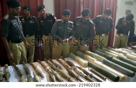 QUETTA, PAKISTAN - SEP 24: Police exposed explosive material and seized weapons  recovered during raid on a house located at Al-Gillani Road on September  24, 2014 in Quetta. .