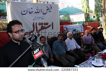 KARACHI, PAKISTAN - OCT 01: Journalist, Faizullah Khan who recently released by Afghan troops after detention, addressing during reception held at Karachi press club on October 01, 2014.