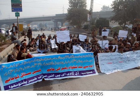 PESHAWAR, PAKISTAN - DEC 30: Hundreds of health workers of the (EPI) protested against the non-payment of salaries for more than seven months on December 30, 2014 in Peshawar.