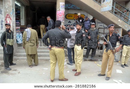 QUETTA, PAKISTAN - MAY 27: Security staff cordon off crime scene where two persons belong to Hazara Shiite Community killed by unidentified assailants on May 27, 2015 in Quetta.