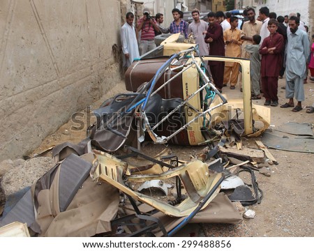 KARACHI, PAKISTAN - JUL 24: View of venue after a blast into gas cylinder planted on an auto rickshaw caused two playing children injured, at Sohrab Goth area on July 24, 2015 in Karachi.