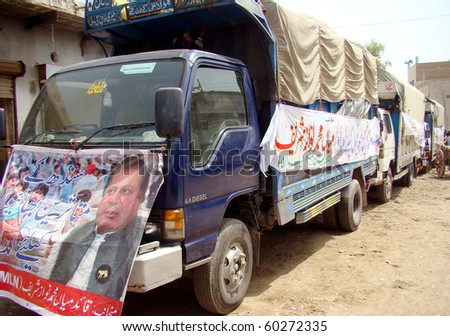 SUKKUR, PAKISTAN-AUG 31: Muslim League N relief aid trucks ready for dispatch  to flood affected areas in Sukkur on Tuesday, August 31, 2010. (PPI Images).