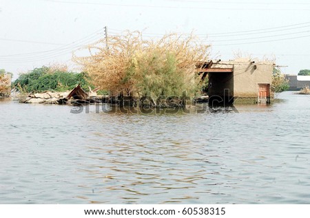 DERA ALLAHYAR, PAKISTAN-SEPT 02: Houses drown in flood water at a flood hit area in Dera Allahyar on Thursday, September 02, 2010. (Arsalan Naseer/PPI Images).