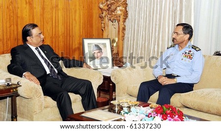 ISLAMABAD -SEPT 16: President, Asif Ali Zardari exchanges views with Air Force Chief of the Air Staff, Air Chief Marshal Rao Qamar Suleman during meeting at Aiwan-e-Sadr Sept 16, 2010 in Islamabad
