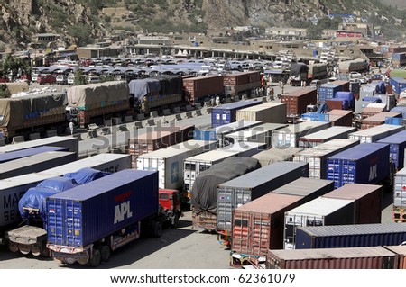 TORKHAM, PAKISTAN- OCT 01: View of Afghanistan-bound NATO trucks parked in Torkham on Friday, October 01, 2010. The main land route for NATO supplies remained blocked in Pakistan on Friday