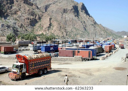 TORKHAM, PAKISTAN, OCT 01: View of Afghanistan-bound NATO trucks parked. The main land route for NATO supplies remained blocked in Pakistan on October 1, 2010 in Torkham, Pakistan.