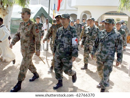 SEHWAN, PAKISTAN - OCT 09: Corps Commander, Lt.Gen.Shahid Iqbal, visits free medical camp for flood affectees established by China Army on October 09, 2010 in Sehwan, Pakistan.