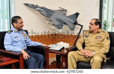 ISLAMABAD, PAKISTAN - OCT 13: Joint Chiefs of Staff Committee, Chairman, Gen.Khalid Shameem Wynne, meets Air Force Air Chief Marshal Rao Qamar Suleman on October 13, 2010 in Islamabad, Pakistan.