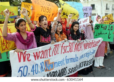 LAHORE, PAKISTAN - OCT 14:  Students of different medical colleges shout slogans against the admissions procedure for medical colleges during protest demonstration on October 14, 2010 in Lahore.