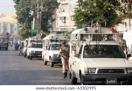 KARACHI, PAKISTAN - CT 16: Rangers officials prepare for patrol in city as security has been tightened in city on the Eve of by-election, at Nazimabad area  on October 16, 2010 in Karachi.